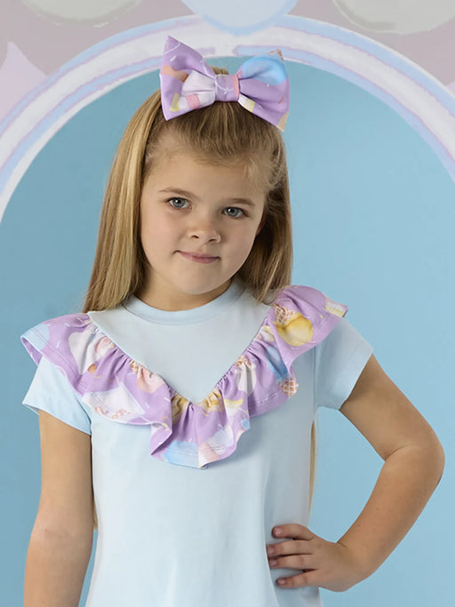 Girl modelling the A Dee solana bow clip.