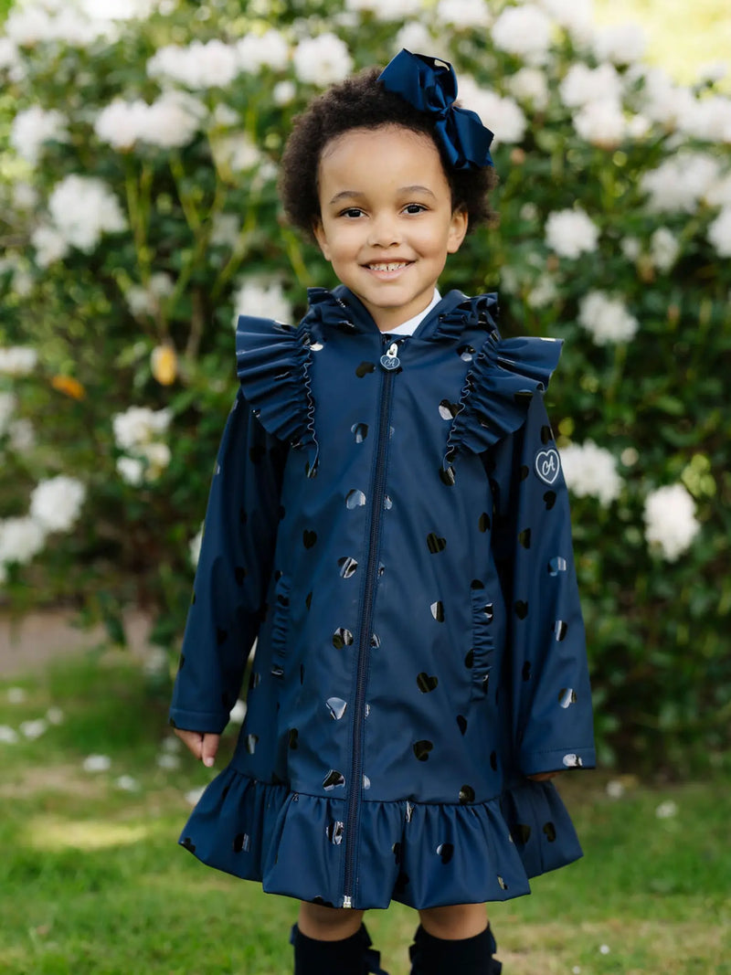 Girl modelling the A Dee stella raincoat.
