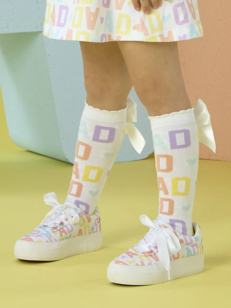 Girl modelling the A Dee sylvia knee socks.