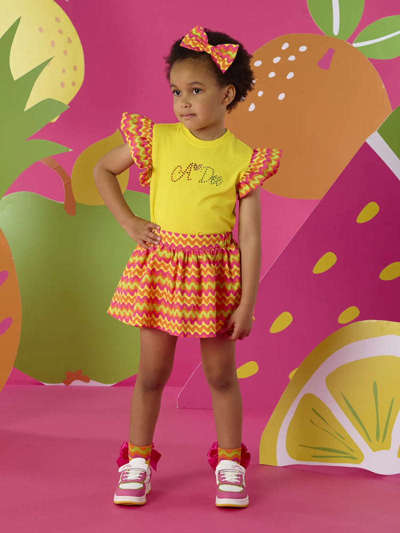 Girl wearing the A Dee tiffany skort set.