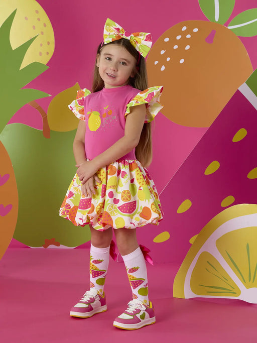 Girl modelling the A Dee tilly dress.