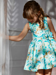 Girl modelling the Abel and Lula floral dress.