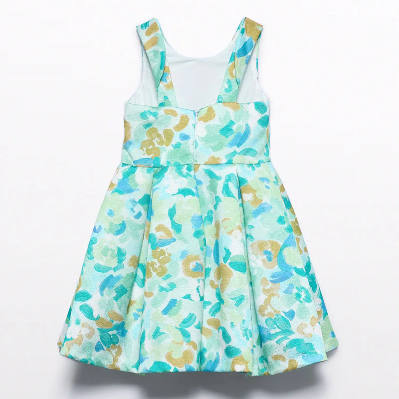 Rear view of the Abel and Lula green floral dress.