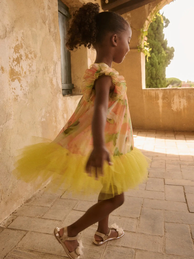 Girl wearing the Abel and Lula floral dress.
