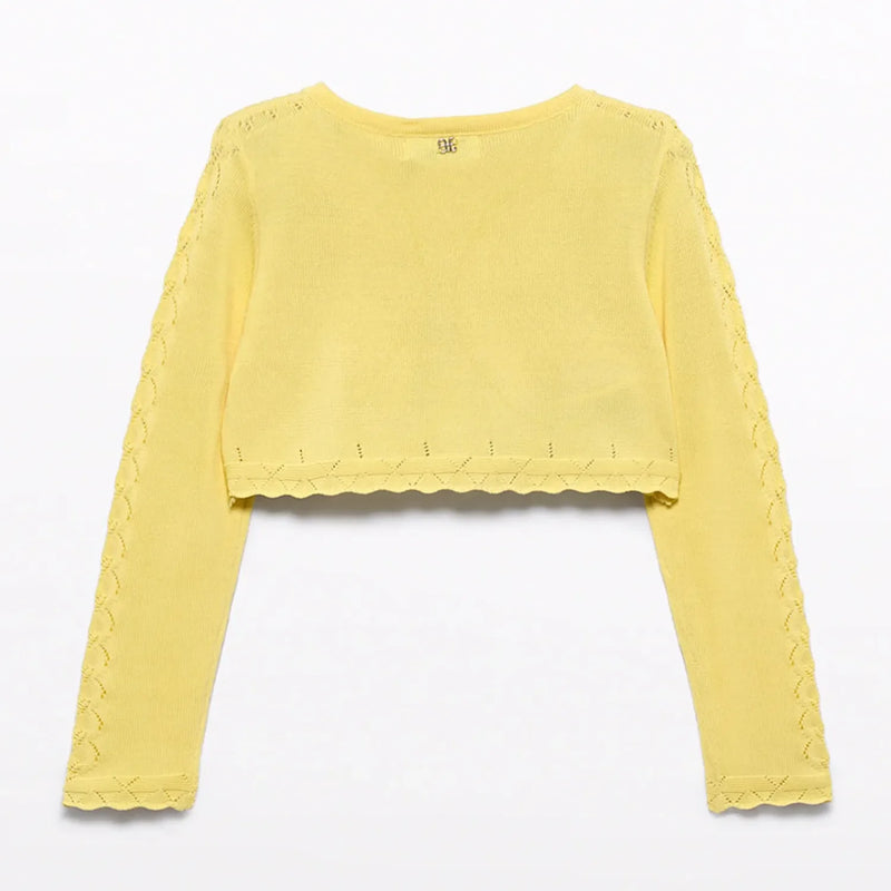 Back of the Abel and Lula yellow knitted bolero cardigan.