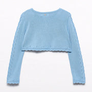 Back of the Abel and Lula girl's knitted bolero cardigan.