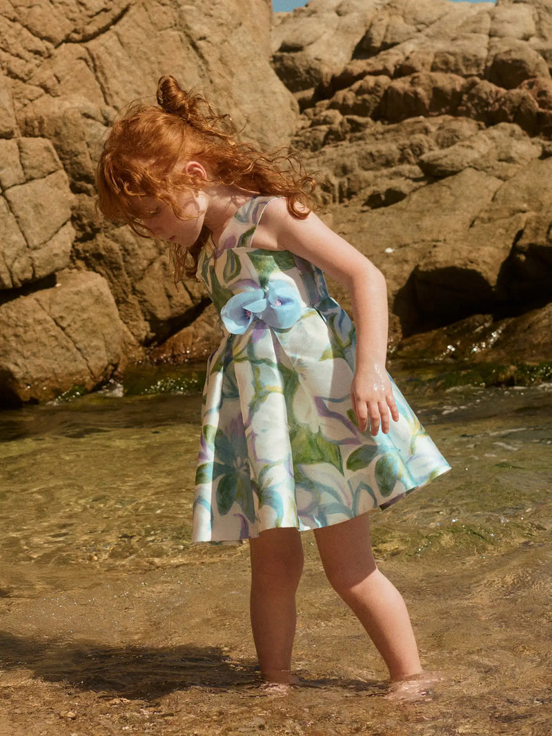 Girl modelling the Abel and Lula mikado dress.