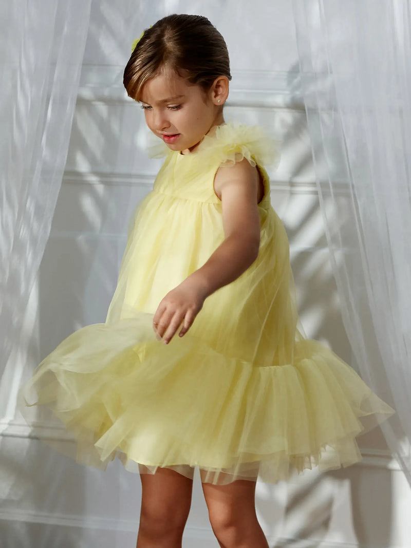 Girl modelling the Abel and Lula tulle dress.