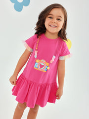 Girl modelling the Agatha Ruiz de la Prada camera dress.