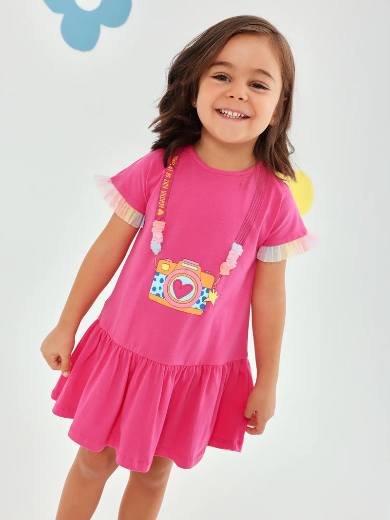 Girl modelling the Agatha Ruiz de la Prada camera dress.
