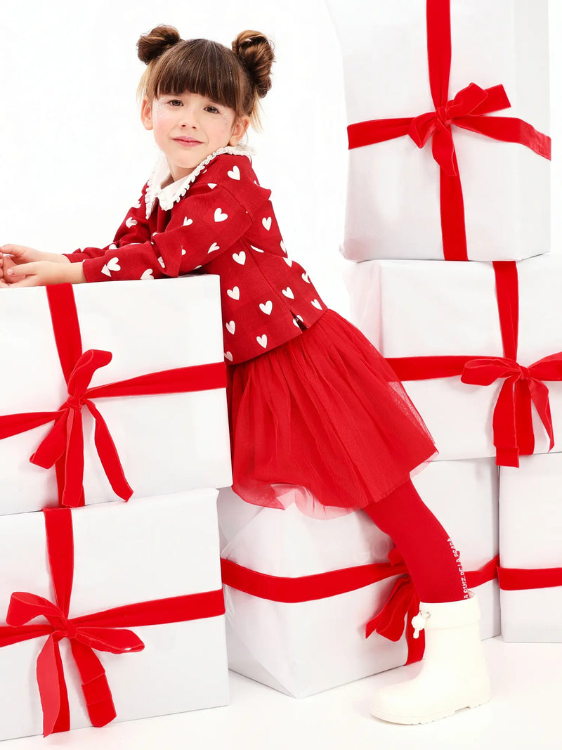 Girl wearing the Agatha Ruiz de la Prada checkerboard skirt set.