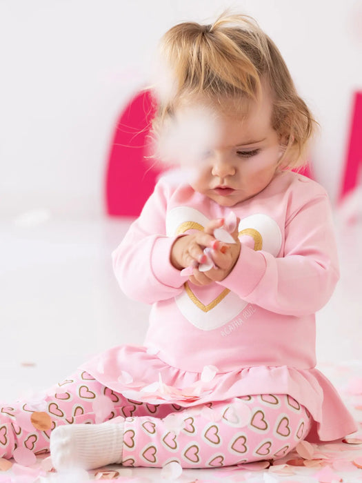 Girl wearing the Agatha Ruiz de la Prada cotton candy leggings set.