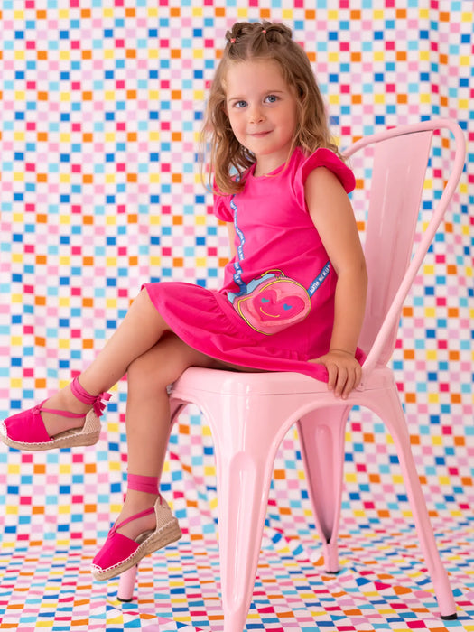 Girl modelling the Agatha Ruiz de la Prada daffoldil dress.