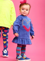 Girl wearing the Agatha Ruiz de la Prada heart dress.