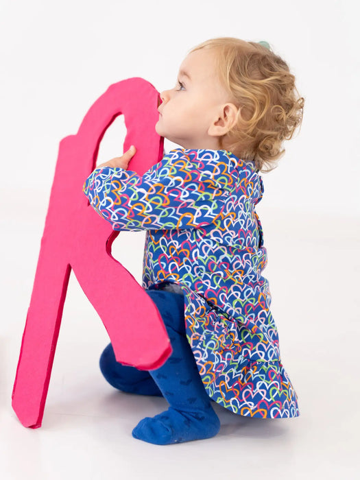 Girl wearing the Agatha Ruiz de la Prada heart print dress.