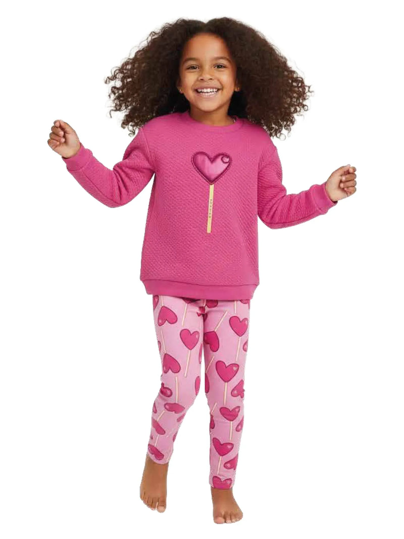 Girl wearing the Agatha Ruiz de la Prada lollipop leggings set.
