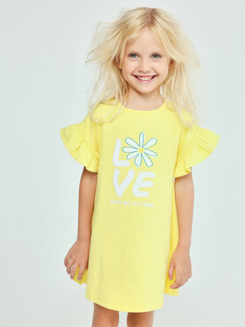 Smiling Girl modelling the Agatha Ruiz de la Prada margarita dress.