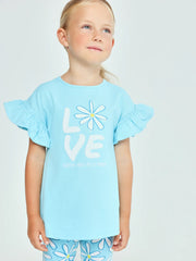 Girl wearing the Agatha Ruiz de la Prada margarita leggings set.