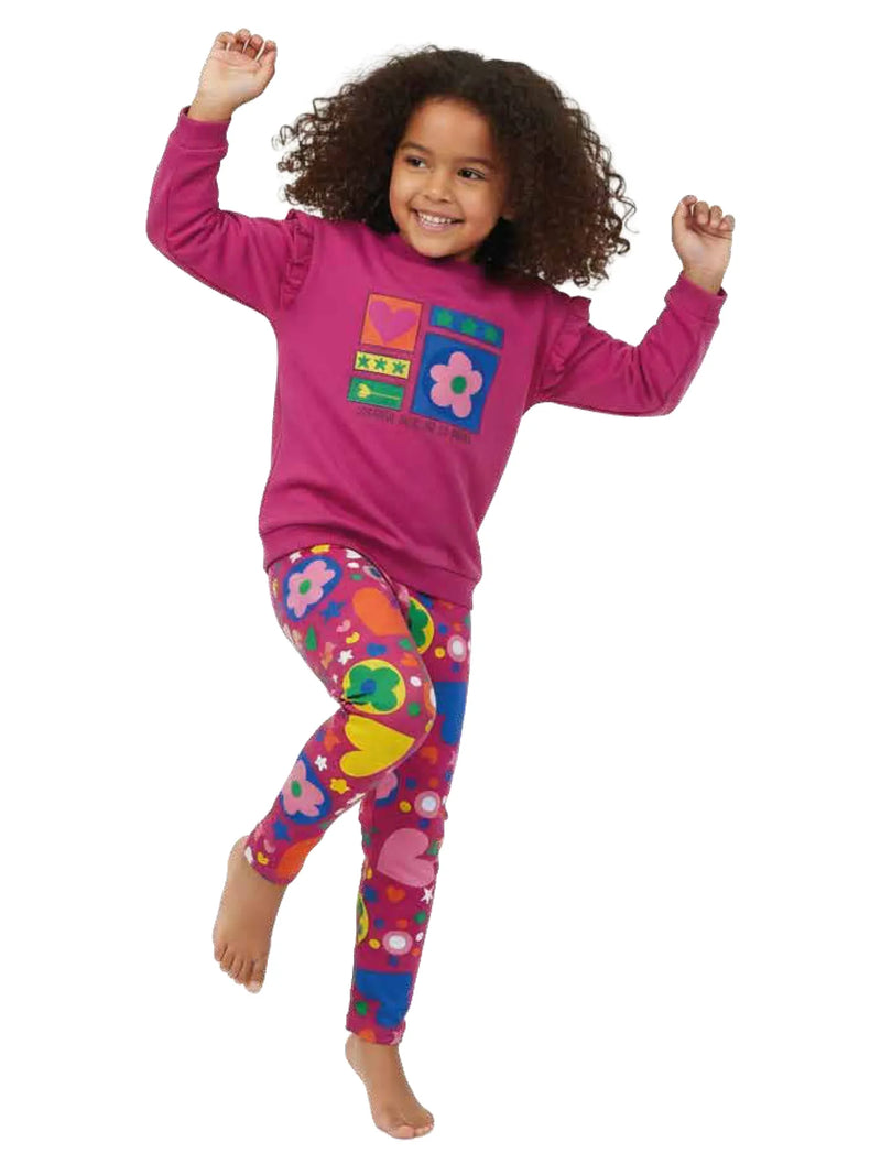 Girl modelling the Agatha Ruiz de la Prada patterned leggings set.