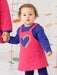 Girl wearing the Agatha Ruiz de la Prada quilted dress.