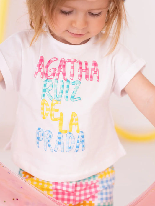 Girl wearing the Agatha Ruiz de la Prada hibiscus shorts set.