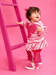 Girl wearing the Agatha Ruiz de la Prada striped dress.