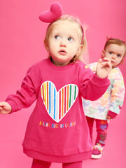 Girl wearing the Agatha Ruiz de la Prada sweatshirt dress.