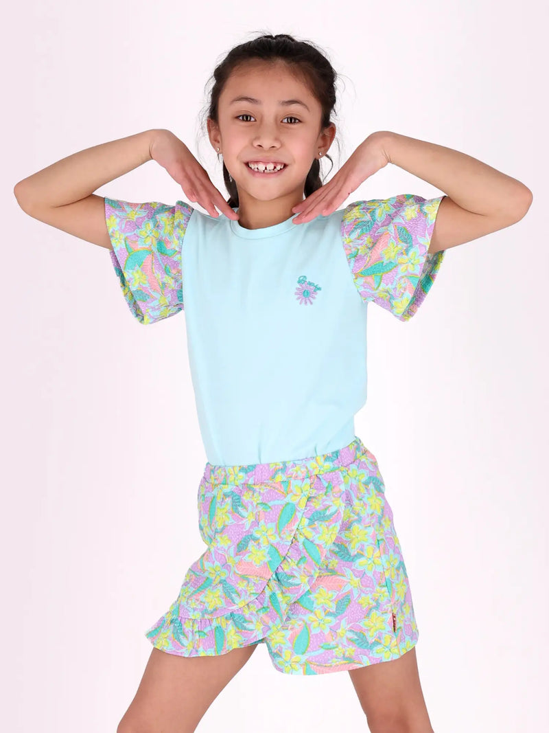 Girl modelling the B.Nosy printed skort set.