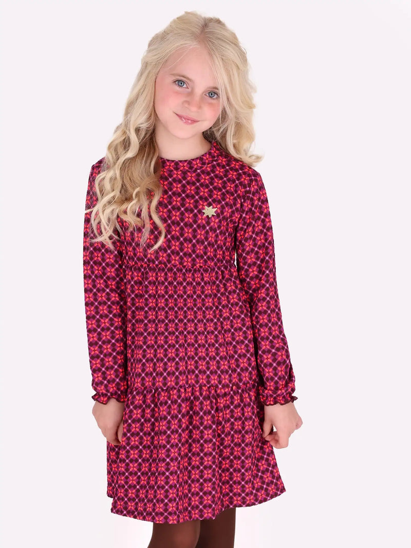 Closer look at the B.Nosy dee dress showing detail of the geometric pattern.