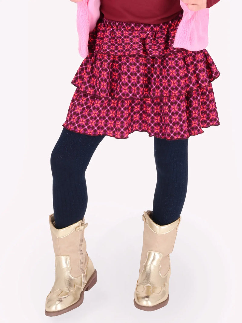 Closer look at the B.Nosy rua skirt showing detail of the geometric pattern.