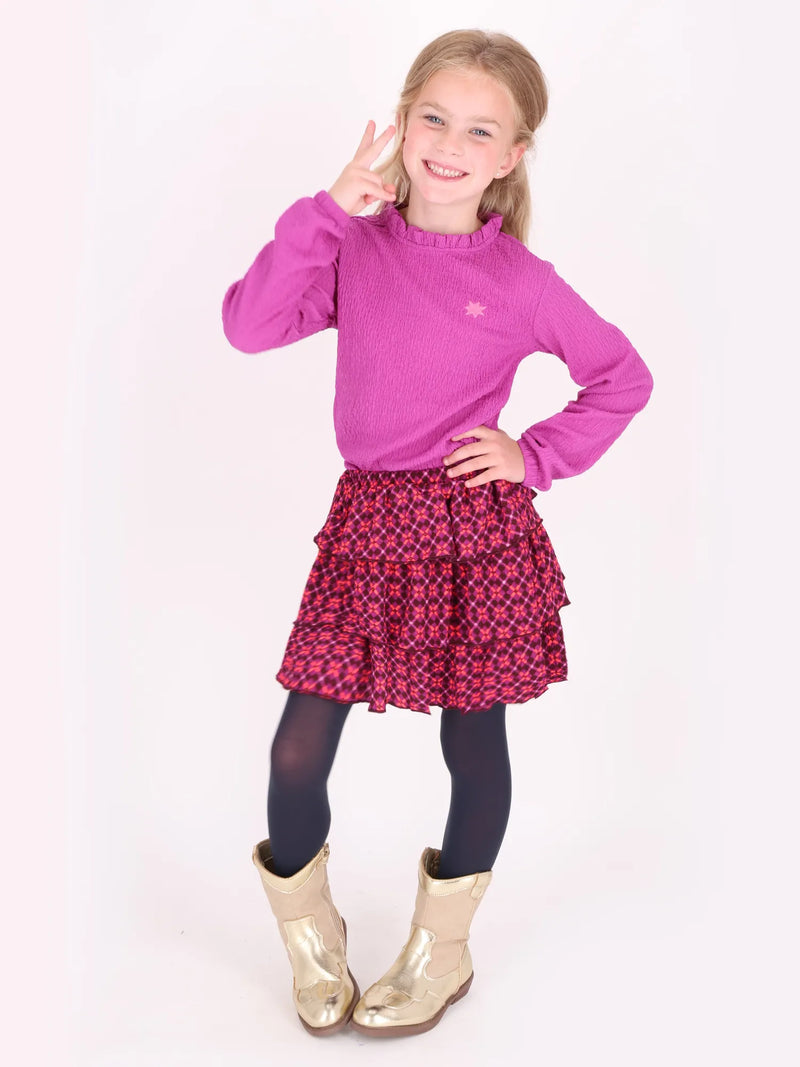 Girl modelling the B.Nosy rua skirt.