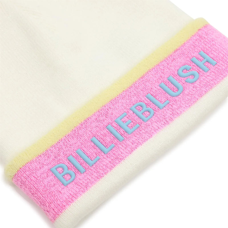 Closer look at the Billieblush beanie showing detail of the blue embroidered logo.