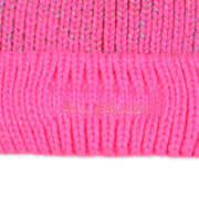 Closer look at the Billieblush bobble hat showing detail of the gel logo