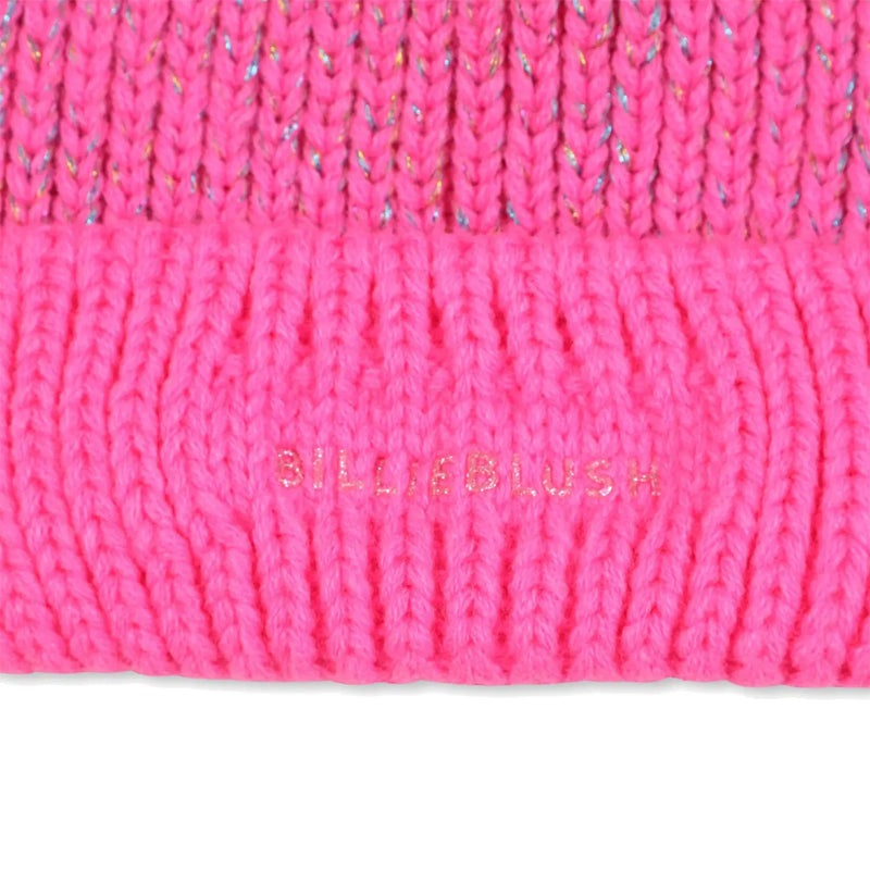 Closer look at the Billieblush bobble hat showing detail of the gel logo