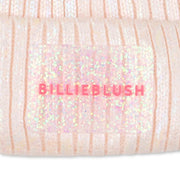 Closer look at the Billieblush bobble hat showing detail of the glitter logo patch