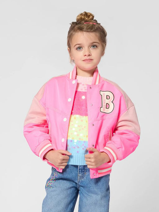 Smiling Girl modelling the Billieblush bomber jacket.