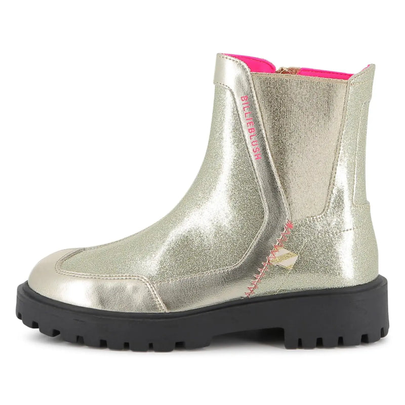 Side view of the Billieblush gold glitter boots.