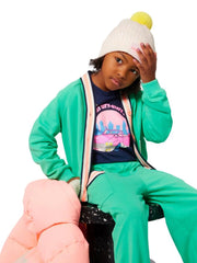 Billieblush green cardigan, modelled by girl.