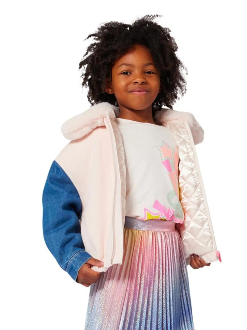 Smiling Girl modelling the Billieblush colourblock jacket.