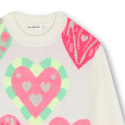 Closer look at the Billieblush combined dress showing detail of the colourful heart design.