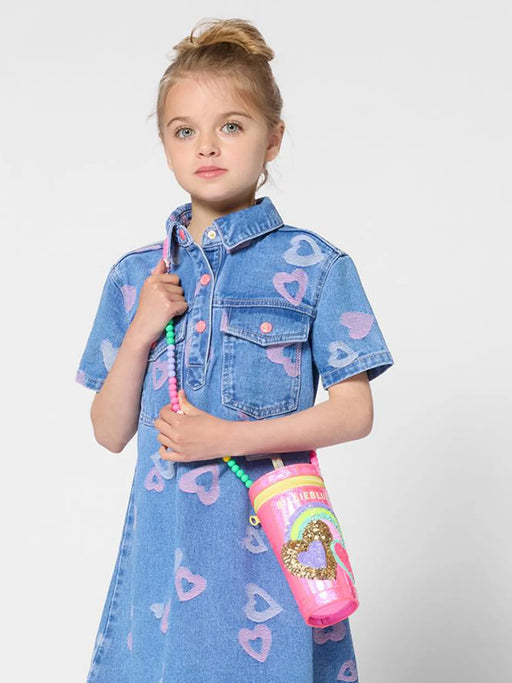 girl modelling the Billieblush sequin cup bag.