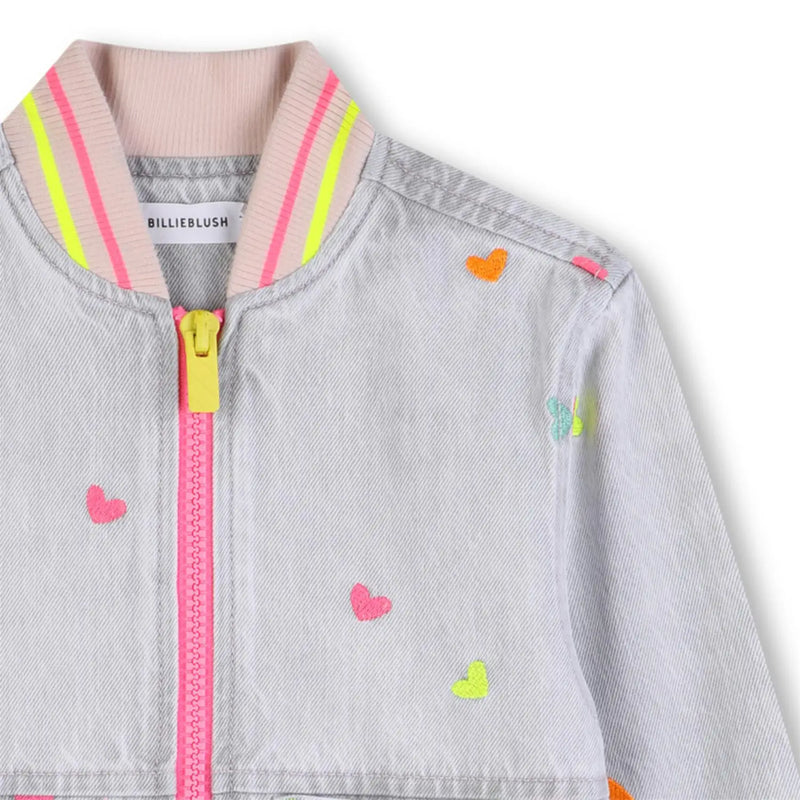 Closer view of the Billieblush denim bomber jacket.