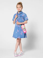 Girl in blue denim dress by Billieblush.