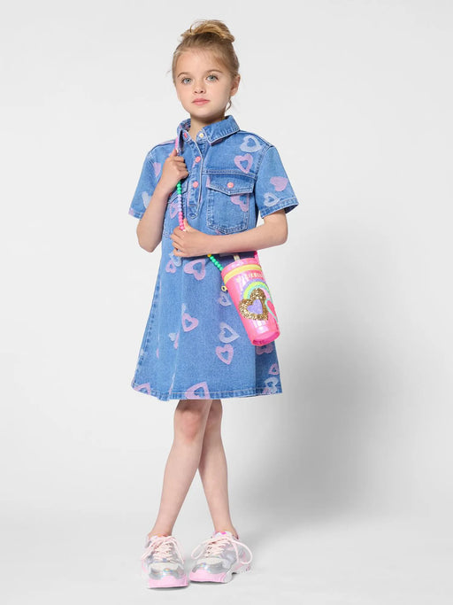 Girl in blue denim dress by Billieblush.