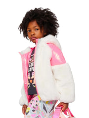 Girl modelling the Billieblush faux fur jacket.