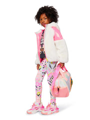 Girl modelling the Billieblush printed leggings.