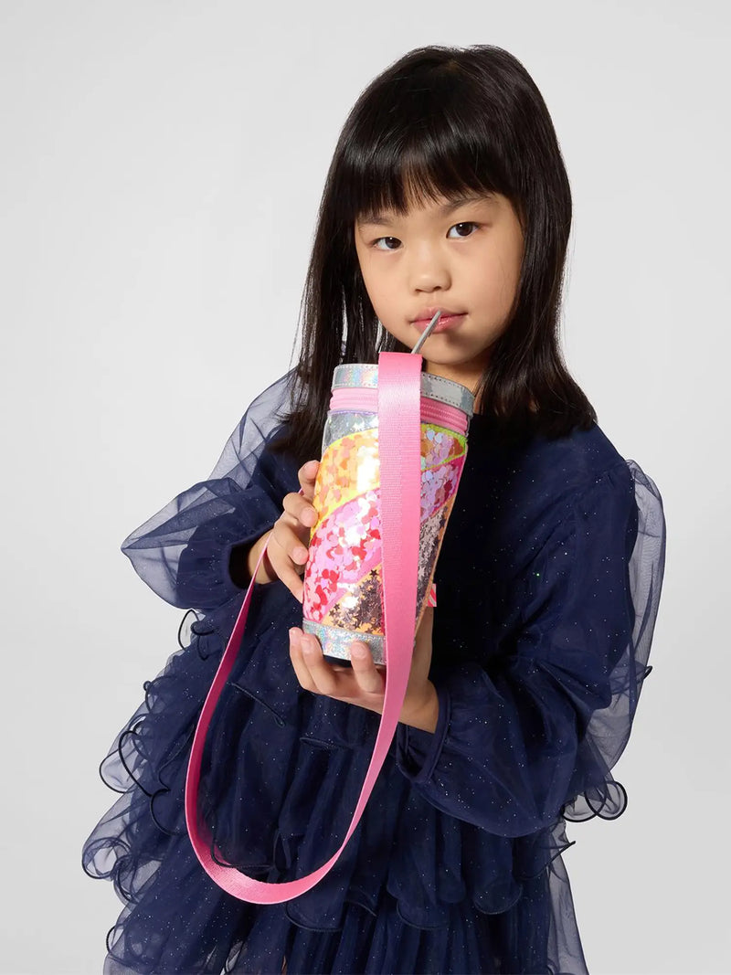 Billieblush glitter cup bag, modelled by girl.