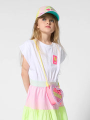 girl modelling the Billieblush heart bag.