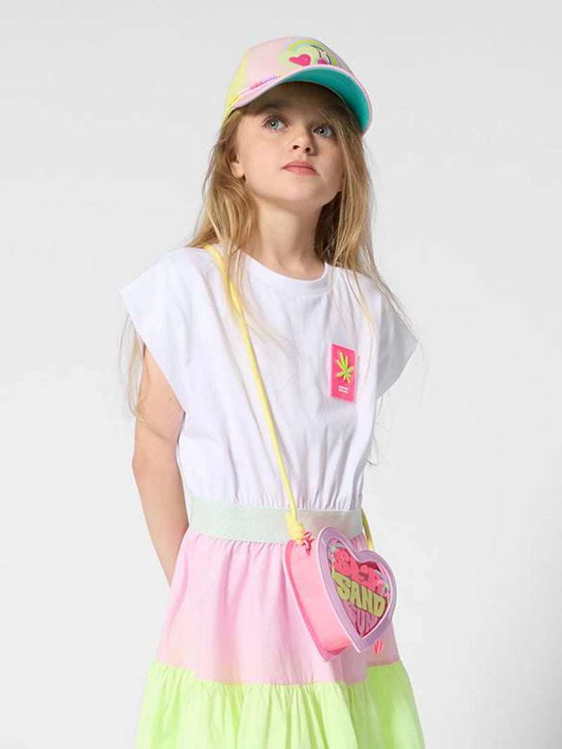 girl modelling the Billieblush heart bag.