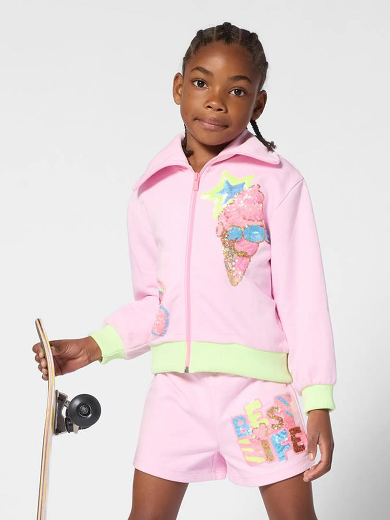 Billieblush sequin sweatshirt, modelled by girl.